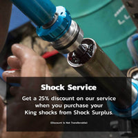 King Shocks 2.5 Performance w/ Remote Reservoir + Rear Reservoir Shocks Set for 2000-2010 GMC Sierra 3500 HD 4WD w/0-2.5" lift